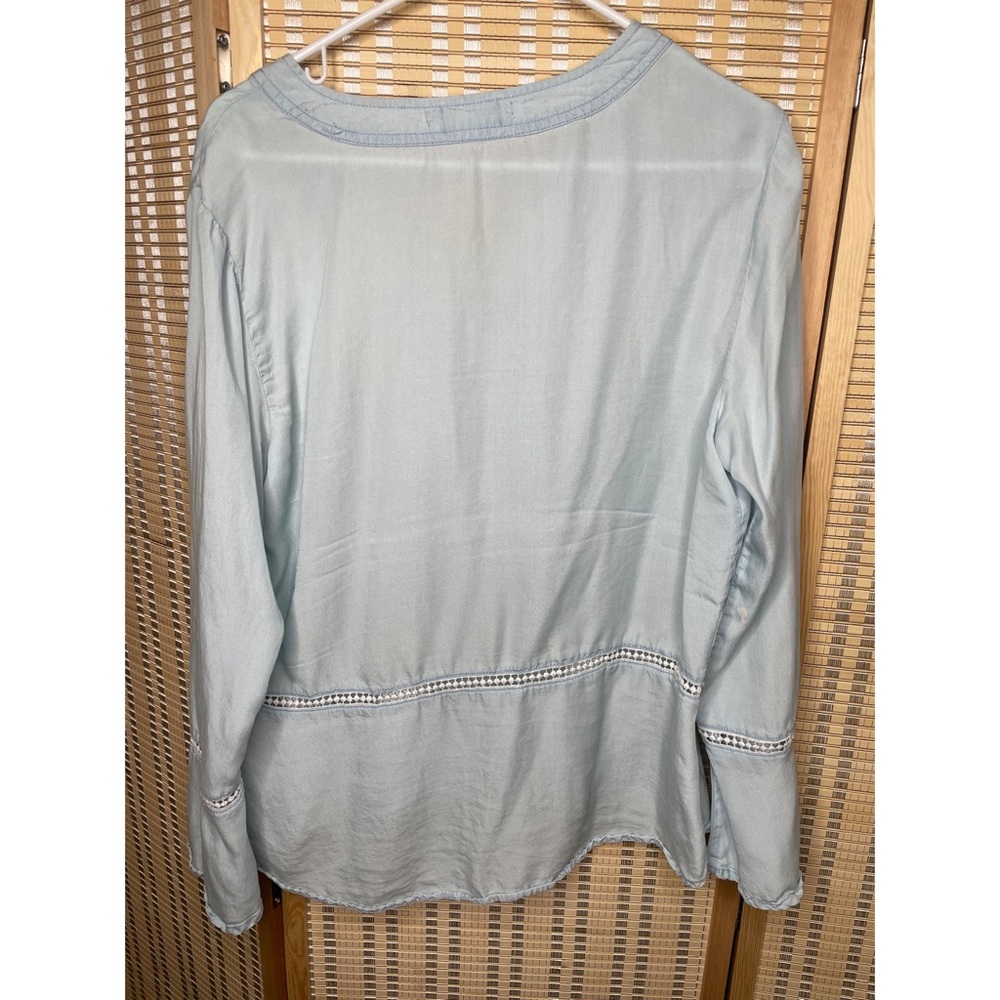 Fourteenth Place size large long sleeve in-bordering blouse . Baby blue color .